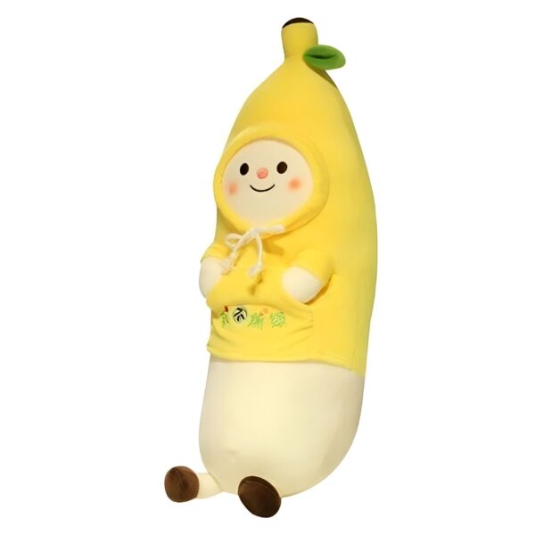 peluche-banane-kawaii-oreiller-doux-et-moelleux-4a Peluche banane jaune souriante portant un sweat à capuche jaune avec une poche brodée.
