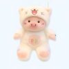 Une peluche de cochon blanc portant un costume de chat.