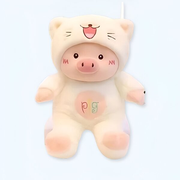 Une peluche de cochon blanc portant un costume de chat.