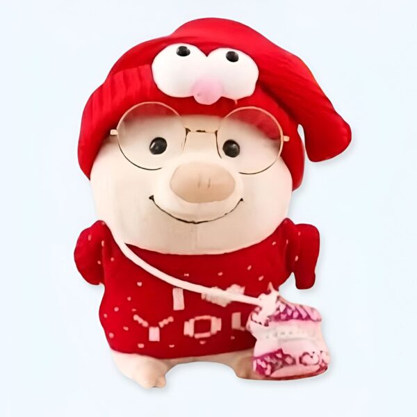peluche-cochon-habille-pull-i-love-you-1a-2 Un cochon en peluche portant un chapeau rouge avec des lunettes et un chandail rouge avec un sac à main rose.