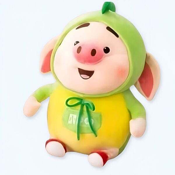 peluche-cochon-kawaii-verte-jouet-doux-et-mignon-1a-2 Un adorable petit cochon en peluche portant une combinaison verte et jaune avec un nœud vert.