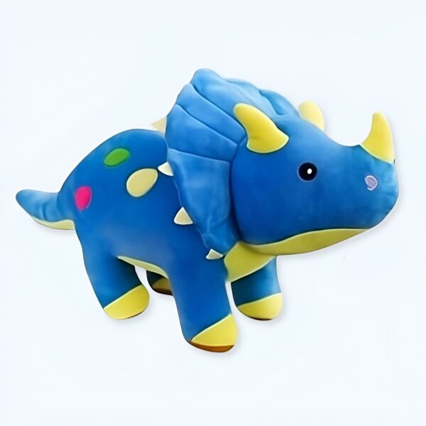 Un dinosaure en peluche bleu avec des détails jaunes et multicolores.