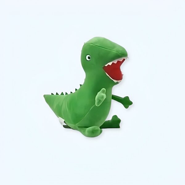 Une peluche verte de dinosaure avec une bouche ouverte et des dents rouges.