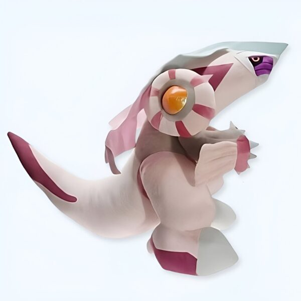 Une figurine de Dialga, un Pokémon légendaire de type Acier et Dragon, avec une coloration rose et blanche.