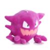 Gengar, le Pokémon fantôme violet, souriant avec ses yeux et sa bouche brodés.