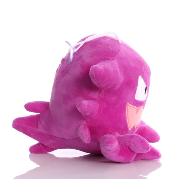 Peluche rose de la créature Pokémon "Gengar" en position debout sur un fond blanc.