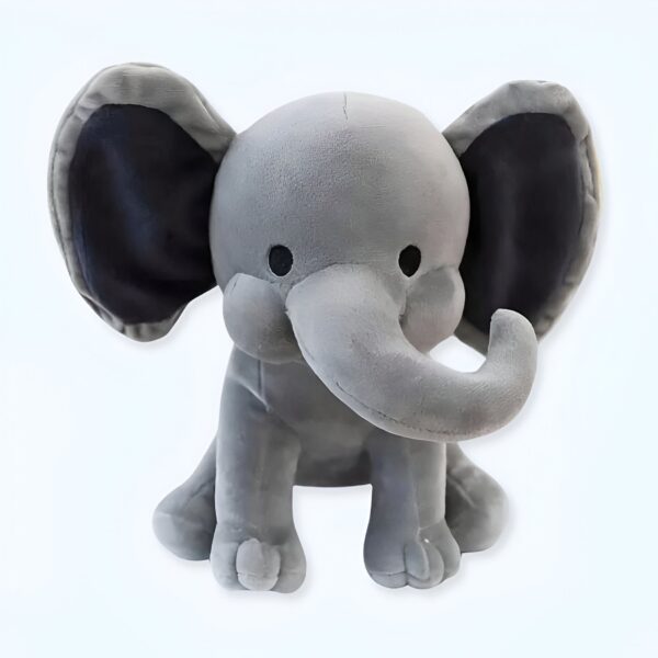 Un éléphant en peluche gris avec de grandes oreilles et de grands yeux.