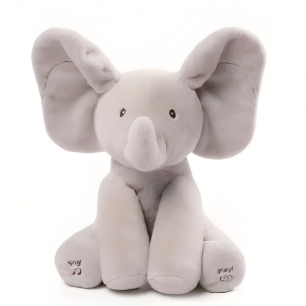 Un éléphant en peluche gris assis avec des oreilles qui bougent. Il a des boutons "Sing" et "Play" sur ses pattes.