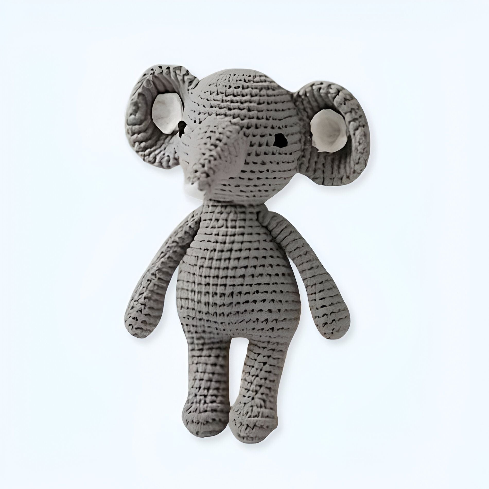 Peluche de elefante tejido suave y seguro para bebés.