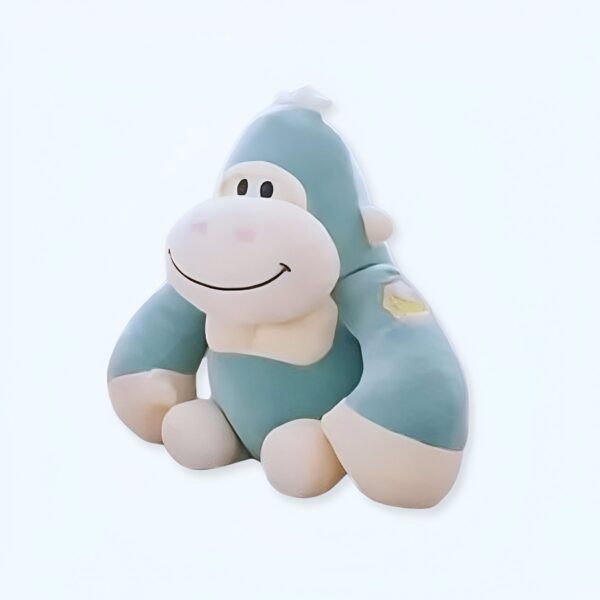 peluche-gorille-bleu-jouet-doux-pour-enfants-30cm-1a-2 Une peluche de gorille bleu souriant avec des détails blancs.