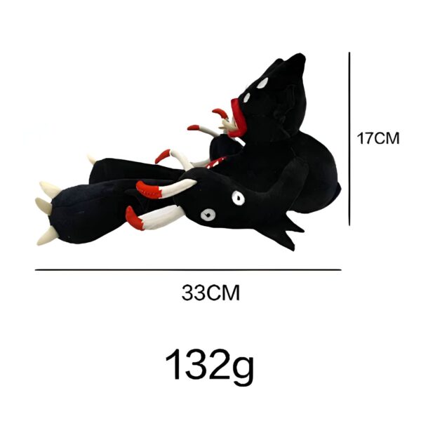 Peluche noire avec des yeux blancs et des griffes rouges, mesurant 33 cm de long et 17 cm de haut.