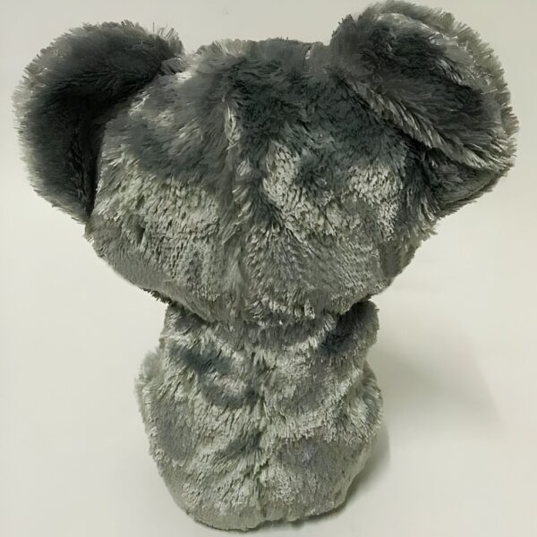 Peluche gris en forme de koala assis, vu de dos.