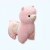 peluche-lama-rose-doudou-tout-doux-pour-enfant-1a Peluche rose de lama avec une selle colorée.
