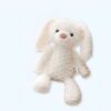 peluche-lapin-blanc-doudou-tout-doux-pour-bebe-et-enfant-1a-4 Un adorable lapin en peluche blanc assis avec de grandes oreilles.