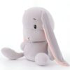 Peluche lapin gris avec de longues oreilles roses.