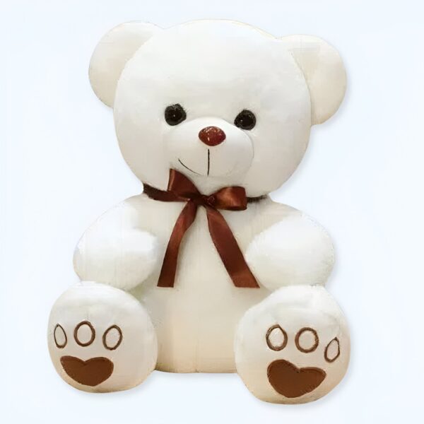 Un ours en peluche blanc avec un nœud brun.