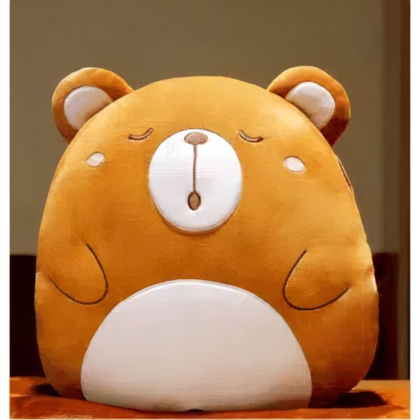 peluche-ours-couverture-doudou-bebe-peluche-oreiller-2a-3 Un ours en peluche marron avec de grands yeux fermés et un ventre blanc.