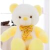 peluche-ours-jaune-kawaii-super-douce-idee-cadeau-2a-3 Ours en peluche blanc avec un nœud jaune et des détails jaunes.
