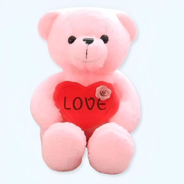 Un ours en peluche rose tenant un cœur rouge avec le mot "LOVE" écrit dessus.