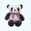 Une peluche adorable en forme de panda avec un ruban rose et blanc.