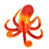 Une pieuvre en peluche orange et rouge avec de grands yeux.
