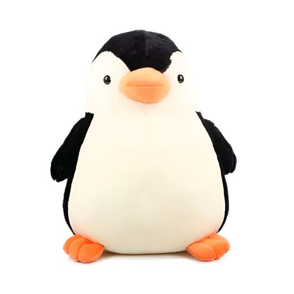 Une peluche de pingouin noir et blanc avec un bec orange.