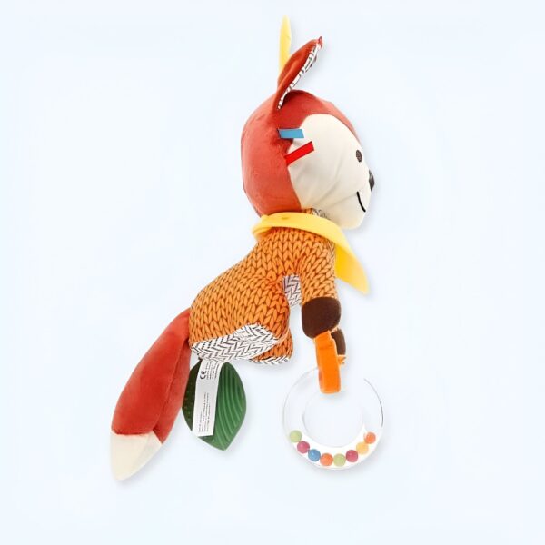 Un renard en peluche orange et marron avec un hochet transparent et coloré.