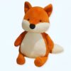 Peluche renard orange assis avec une fourrure douce et un visage adorable.