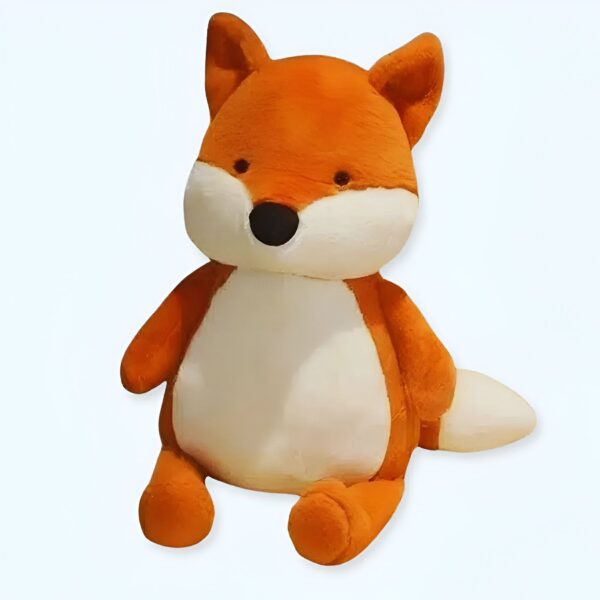 Peluche renard orange assis avec une fourrure douce et un visage adorable.