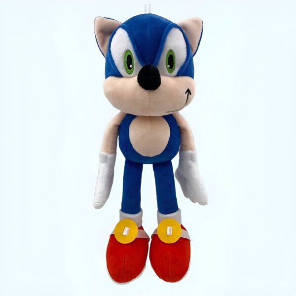 Peluche de Sonic le hérisson, le personnage de jeu vidéo, debout avec ses bras tendus et une expression déterminée.