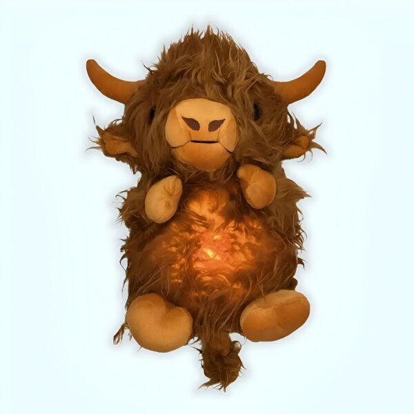 Une peluche de vache écossaise avec une lumière intégrée.