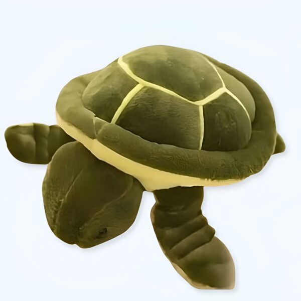 Une tortue en peluche verte avec une carapace beige.