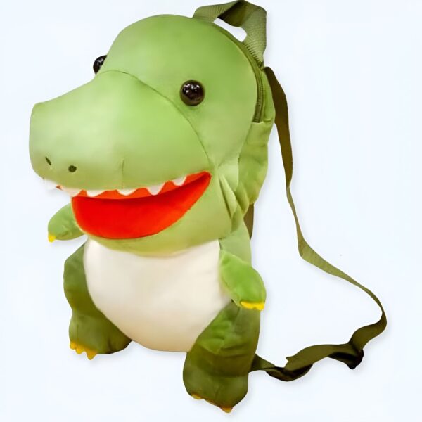 Sac à dos en peluche vert en forme de dinosaure avec une bouche ouverte et des yeux noirs.